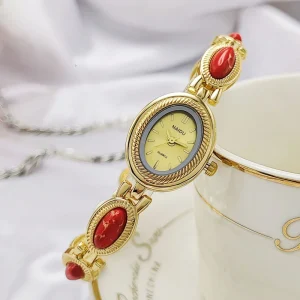 JS 282 Women’s Colored Stone Bracelet Watch Oval Student Versatile Fashion Gold Quartz Watch
