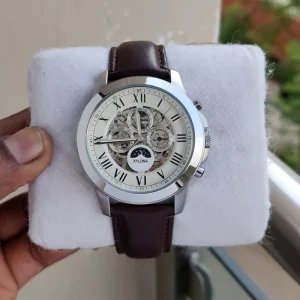 The Men’s Automatic Mechanical Leather Strap Features an Openwork Dial with Four Chronograph Sub dials That Simulate Display